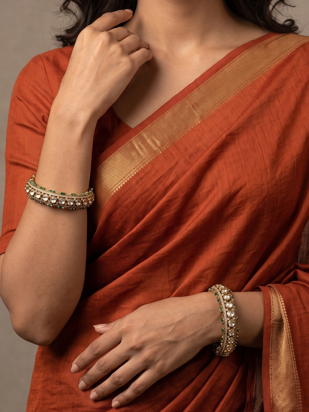 A women wearing Luxury Antique Victorian Polki Kada Bangles With Emerald Stones | Wedding & Bridal Kada Bangles