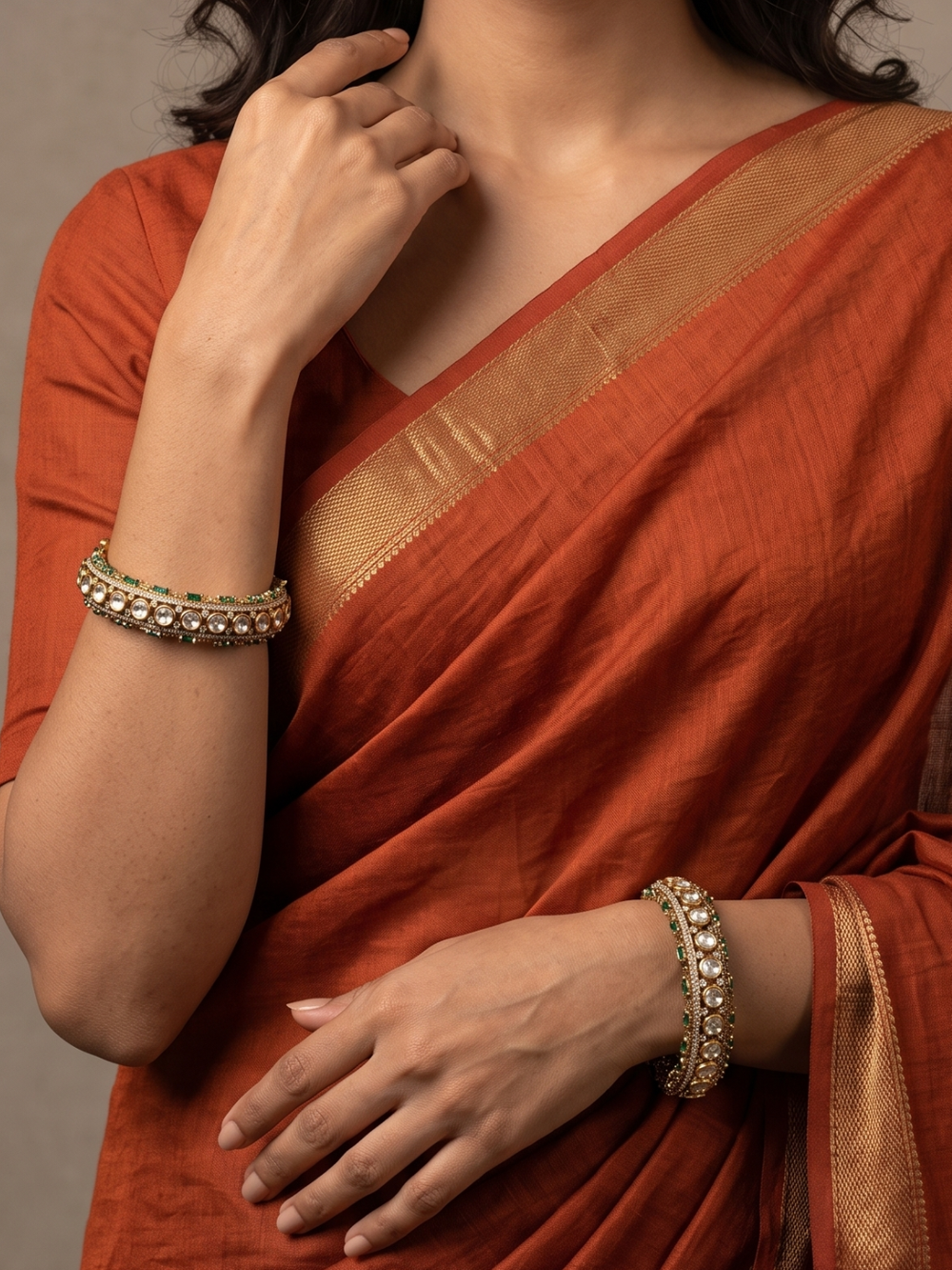 A women wearing Luxury Antique Victorian Polki Kada Bangles With Emerald Stones | Wedding & Bridal Kada Bangles