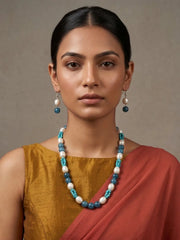 Lady wearing a Contemporary Blue Jade & Pearls Beaded Necklace Set | Indo Western blue colour Beaded Necklace set 