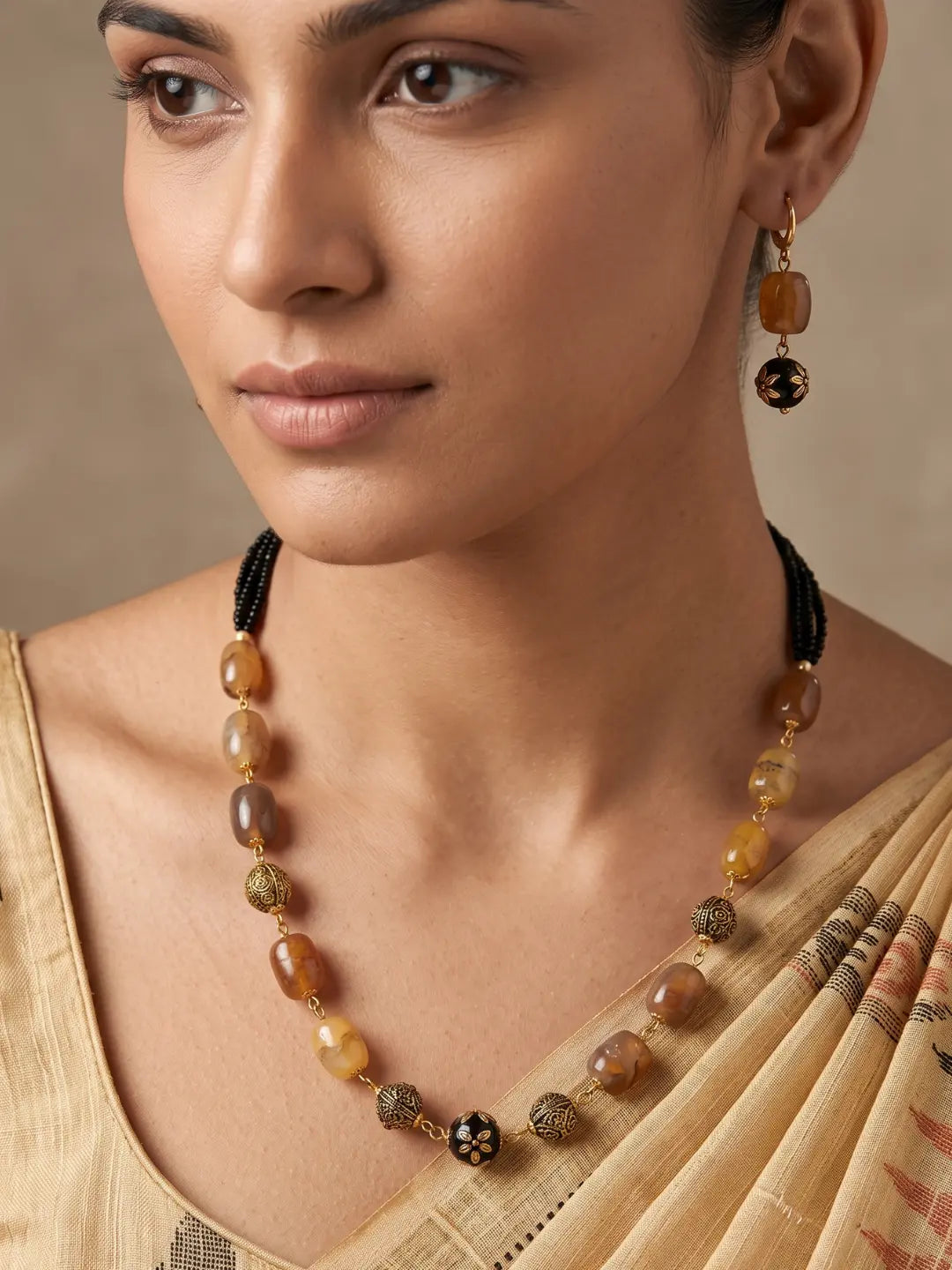 Close-Up Front View of Gold-Plated Beaded Mala with Marcasite and Floral Motif Accents