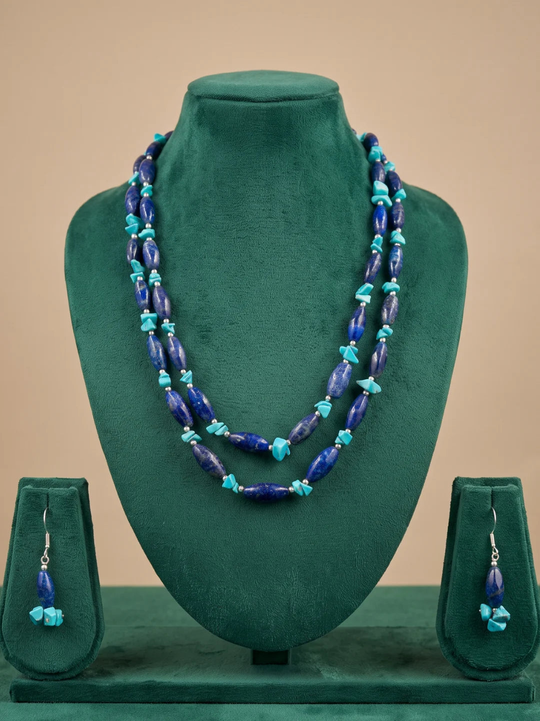 Pair of drop earrings on fish hook wires, shown as the coordinating earrings of the lapis lazuli and turquoise gemstone beaded necklace set