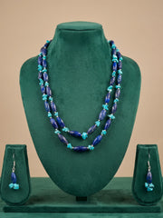 Pair of drop earrings on fish hook wires, shown as the coordinating earrings of the lapis lazuli and turquoise gemstone beaded necklace set