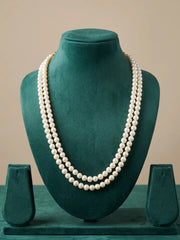 White dual strand pearl necklace shown in a styled view, with the two curved pearl strands sitting along the neckline for a clean, minimalist look