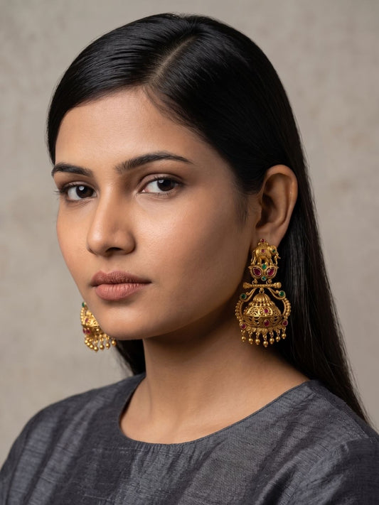 Traditional Elephant Temple Jhumka earrings featuring intricate temple-inspired detailing, Kundan stones, colourful gemstone accents and hanging beads.