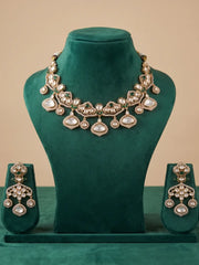 Emerald green polki necklace and earrings set with gold plating, adjustable dori and statement polki detailing for brides