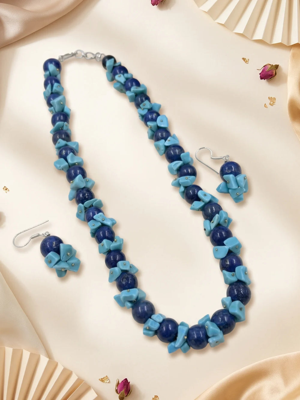 Pair of drop earrings on fish hook wires, shown as the coordinating earrings of the blue lapis lazuli and turquoise beaded necklace set