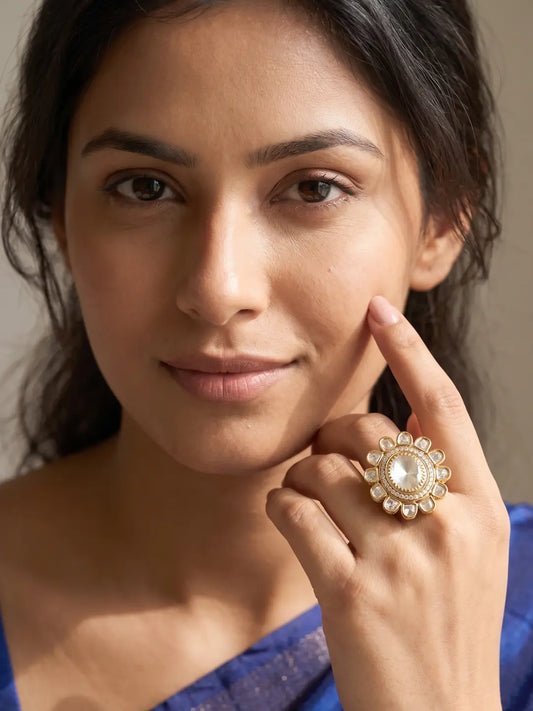 Floral Polki Kundan finger ring with a luminous round centre stone, delicate sparkling halo and gold-tone petal detailing for bridal ethnic wear