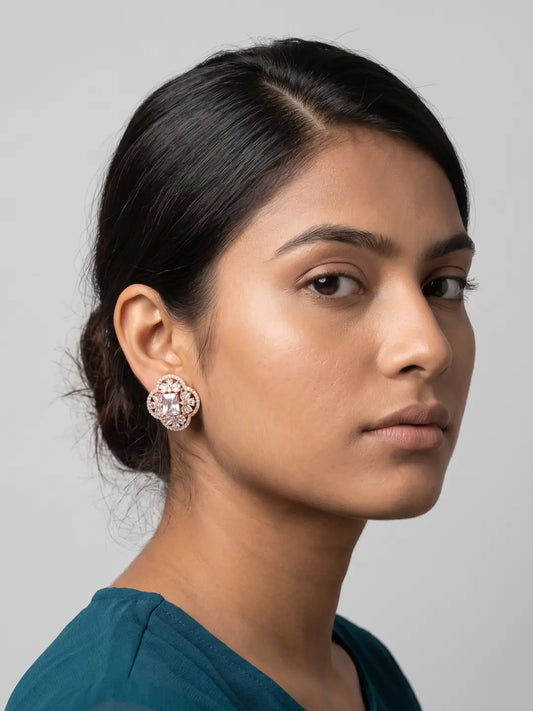 Floral gold plated zircon earrings featuring a brilliant rectangular center stone and layered sparkling details for wedding looks