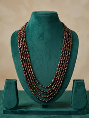Multi-strand garnet and peridot beaded necklace styled as a statement piece with ethnic and Indo-Western outfits for festive occasions
