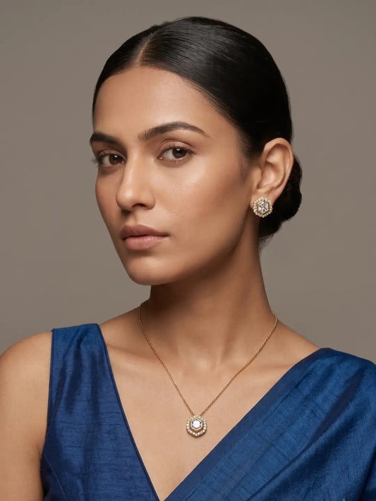 Gold-plated minimal jewellery set with delicate chain necklace, round Polki and Kundan pendant, and matching stud earrings for women