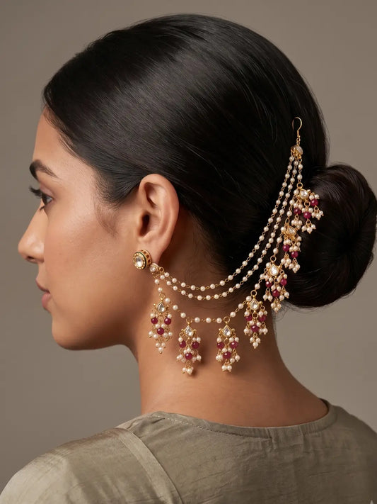 Gold plated ear-to-hair kaan sahar with layered red beads, pearl accents and ornate kundan drops for bridal hair jewellery