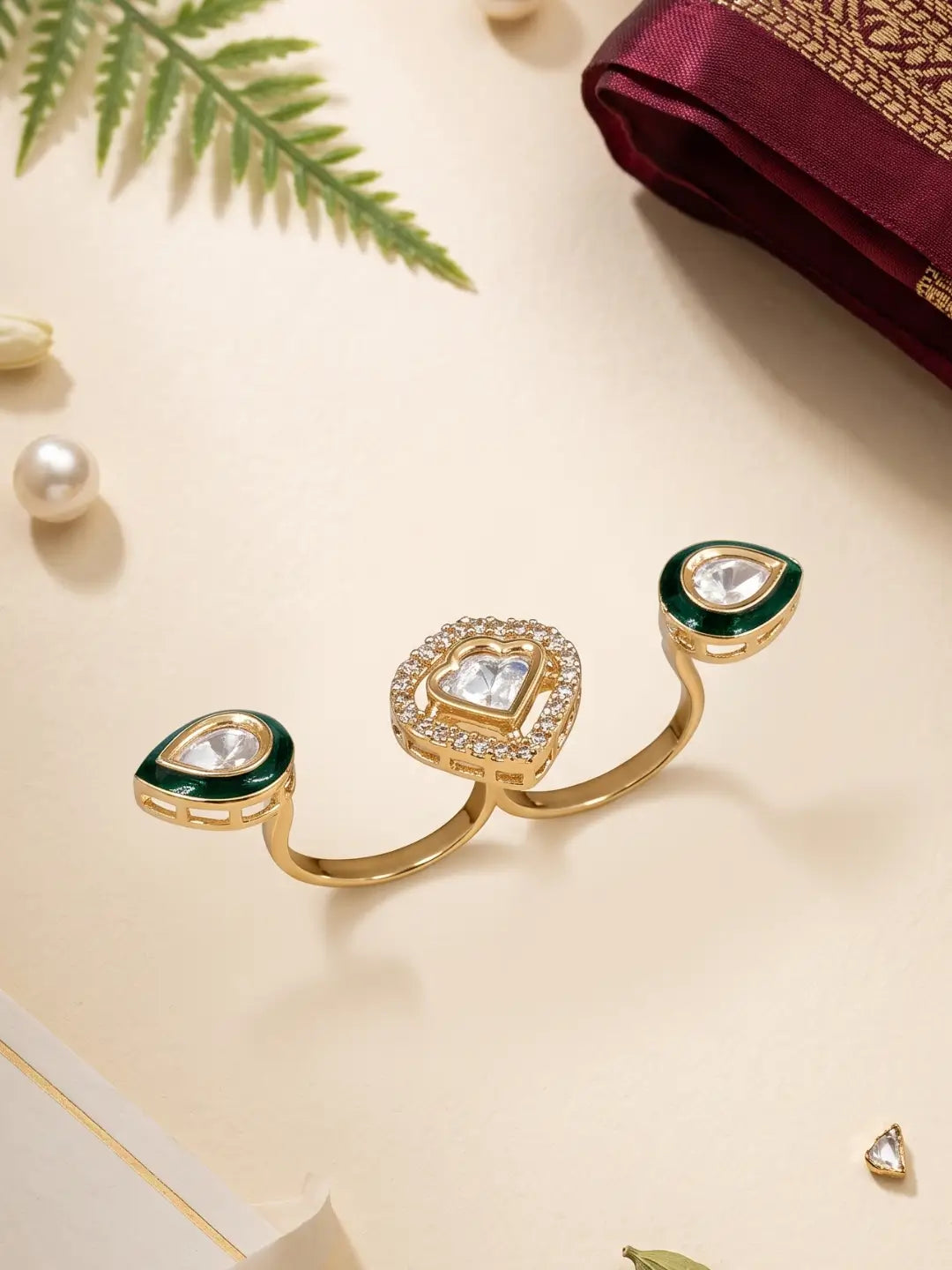 Gold plated green Polki dual statement ring featuring CZ accents, enamel Meena work and three connected focal elements for ethnic and cocktail looks