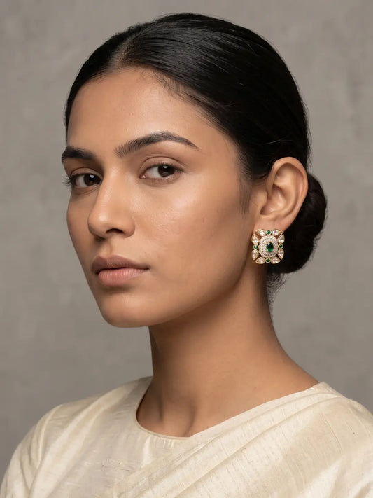 Gold plated green Kundan Polki studs featuring a geometric square frame, green rectangular stone, CZ accents and coloured petal details