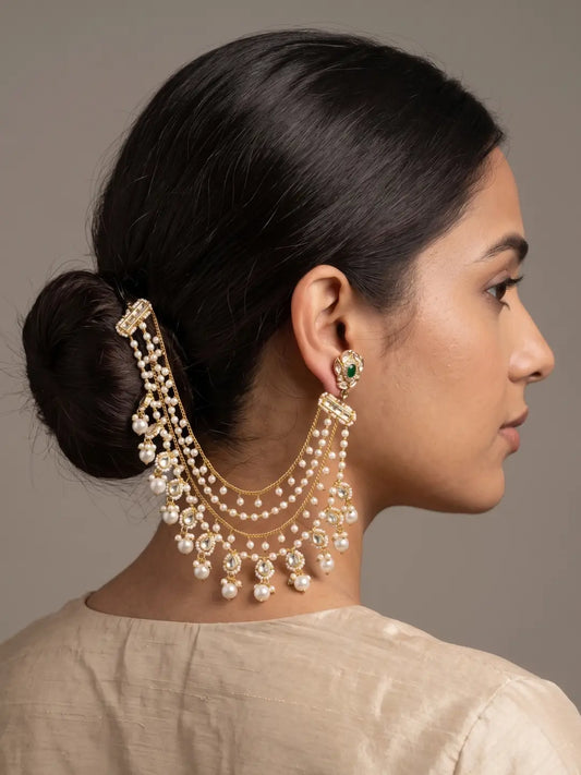 Gold plated layered Kundan pearl ear chain with white shell pearls, stone-set motifs and pearl drops for Indian bridal hair jewellery