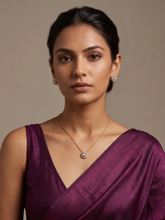Gold plated Kundan and Polki pendant necklace with a delicate chain and matching stud earrings for everyday and festive wear.