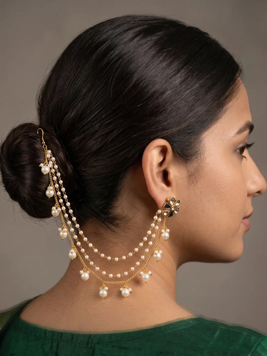 Gold plated pearl ear chain Kaan Sahar with beaded pearl drops for Indian bridal hair and wedding jewellery styling.