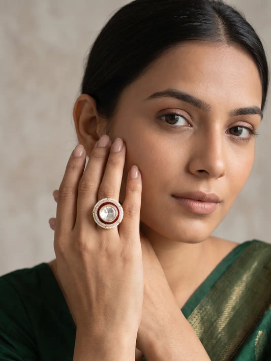 Gold plated red Polki ring featuring a faceted centre stone, red enamel surround, sparkling CZ details and delicate pearl edging for bridal outfits