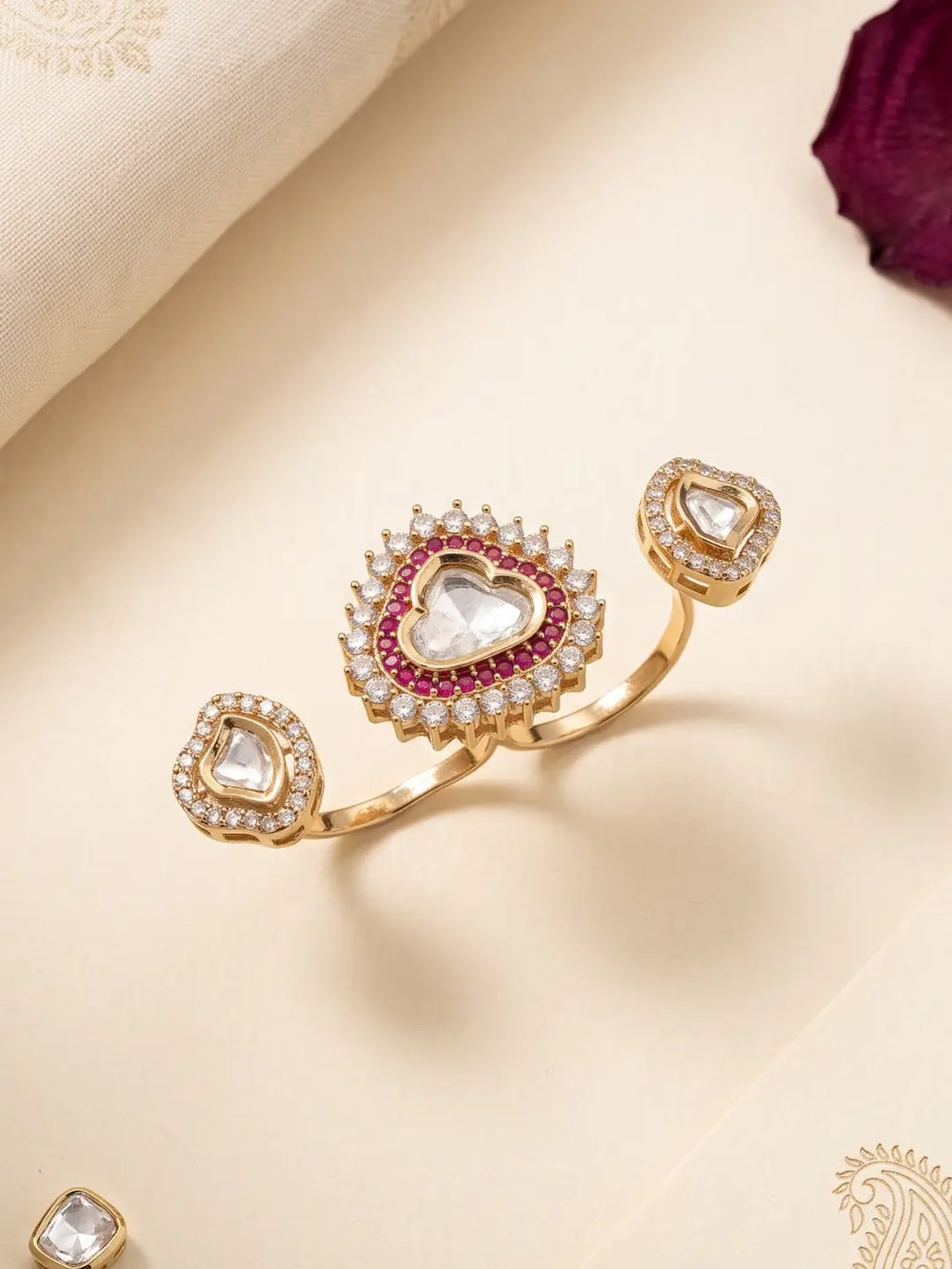Gold plated ruby pink Kundan Polki dual statement ring with imitation ruby accents, CZ detailing and a bold two-band design for occasion wear