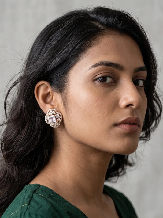 Gold plated zircon stud earrings with a rectangular-cut center stone, floral motifs and sparkling zircon detailing for women