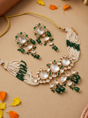 Green beaded Polki Kundan bridal choker set with gold-tone detailing and matching earrings, styled for wedding, engagement and festive looks.