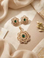 Green floral Kundan pendant and matching stud earrings with sparkling CZ accents, Polki stones and a gold-plated finish.