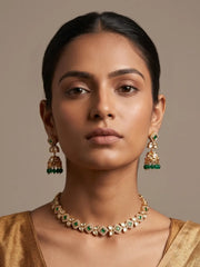 Green Kundan necklace set with Jhumka earrings, Polki and CZ stones with gold-plated detailing for weddings and ethnic occasions