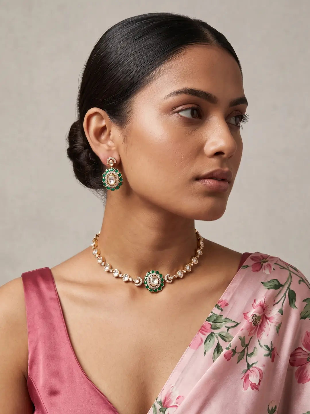 Green Kundan Polki choker necklace with geometric enamel motif, white stone accents and matching earrings for mehendi, sangeet and weddings.