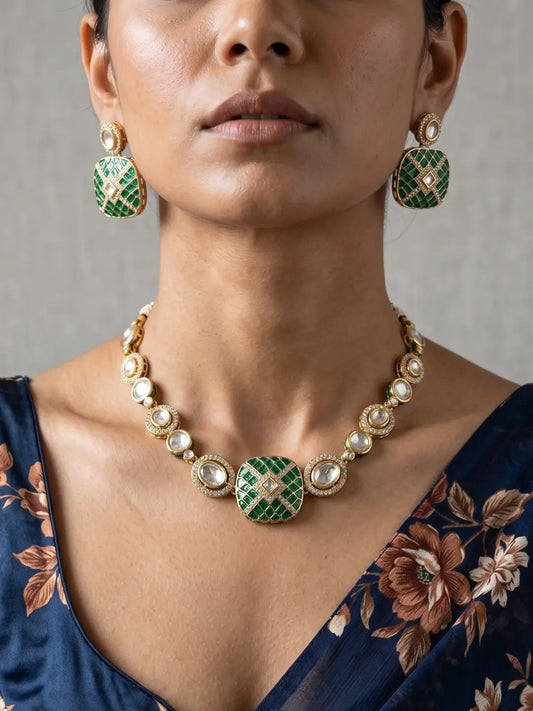 Green Kundan Polki necklace set with CZ stones, green enamel detailing and matching earrings, designed for weddings and festive occasions.