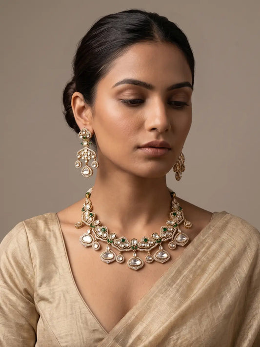 Green polki bridal necklace with dangling polki drops and matching earrings for Indian weddings and festive occasions