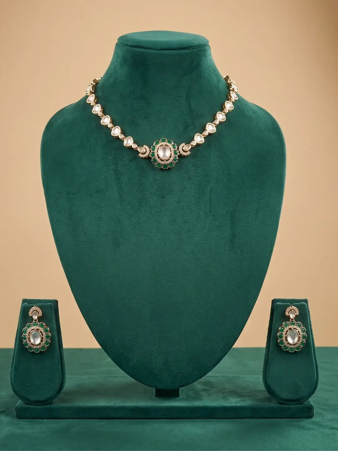 Green Polki Kundan choker necklace set with CZ stones, green enamel detailing and matching earrings for wedding and festive jewellery styling.