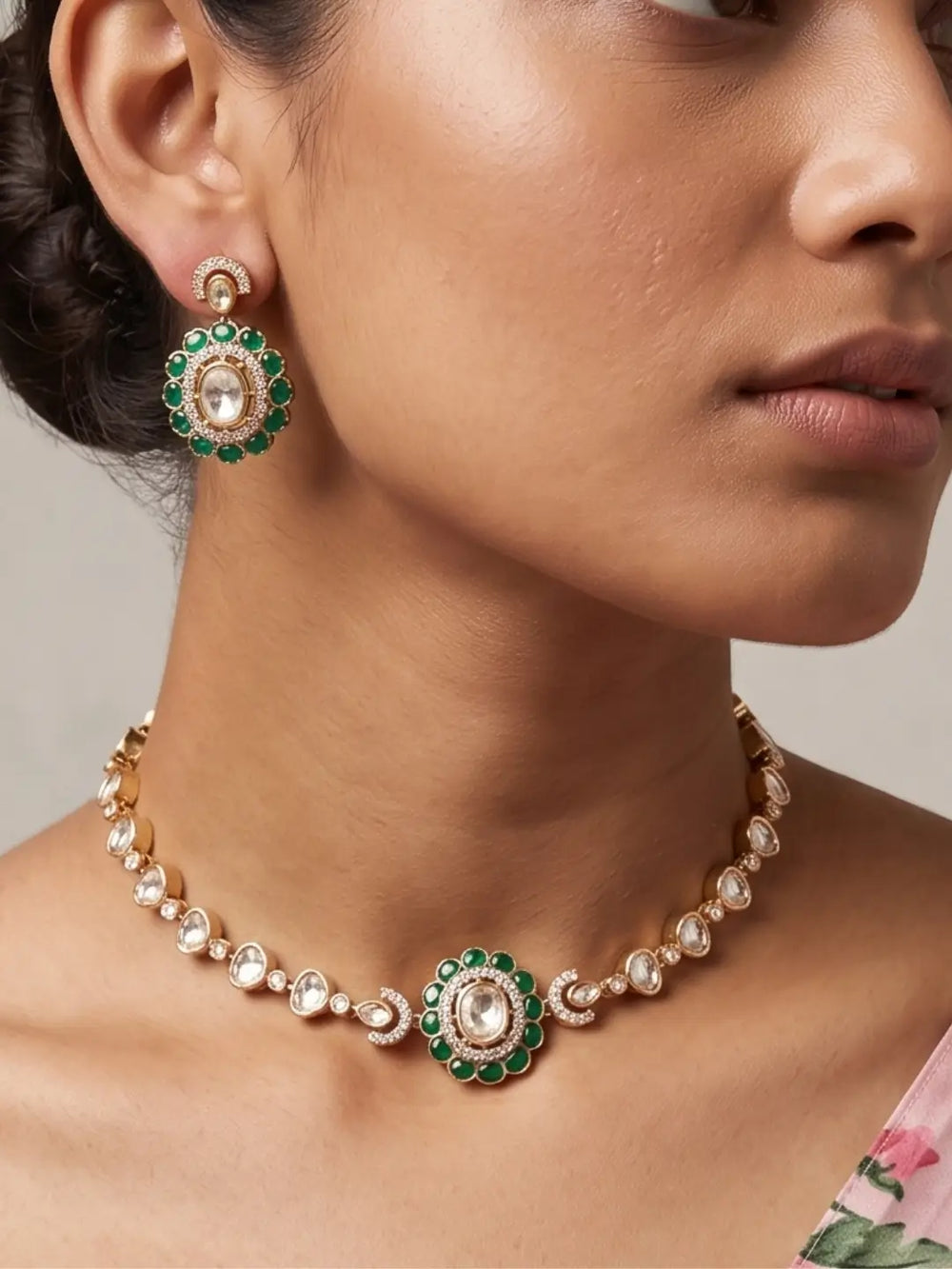 Green polki kundan choker necklace set with white CZ stones, gold-tone detailing, green enamel accents and matching earrings in a coordinated design.