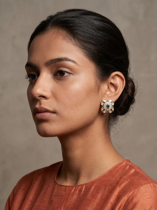 Green square Kundan stud earrings with rectangular centre stone, Polki and CZ detailing, floral petal accents and gold plated setting