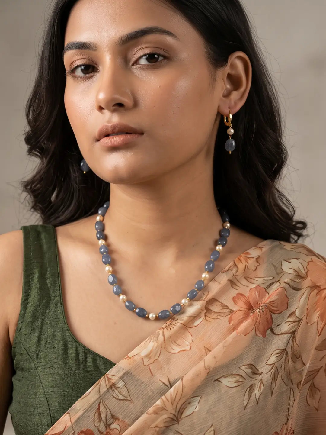 Single-strand grey box-shaped jade bead necklace with faux pearls, shown with matching drop earrings and gold-tone accents