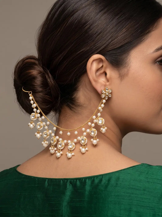 Traditional Kundan pearl ear chain Kaan Sahar featuring teardrop Kundan-style stones, pearl clusters and delicate gold-tone chain for bridal and wedding styling.