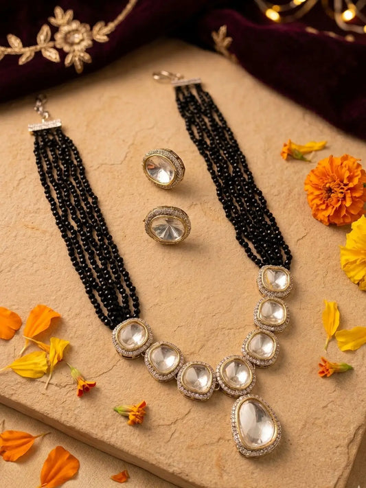 Layered black hydro bead necklace with Kundan and uncut Polki stones, silver-tone accents and coordinated earrings for wedding and festive outfits