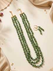 Layered olive green beaded necklace showing the adjustable hook-and-eye closure and the way the strands fall evenly around the neckline