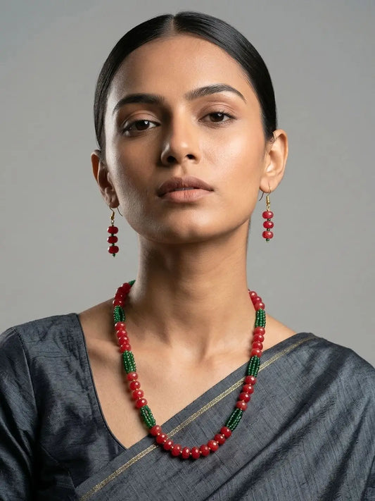 Layered red jade and green hydro bead necklace featuring alternating bead sections and subtle gold-tone accents for sarees, lehengas and ethnic looks
