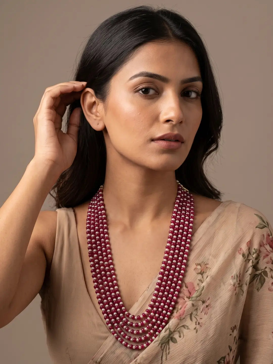 Long ruby red jade and freshwater pearl beaded necklace with multiple strands and gold-plated detailing for wedding, party and festive styling.