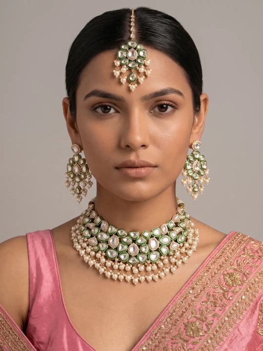 Luxury Green Enamel Bridal Polki Choker Necklace Set with Maang Tikka and Matching Dangler Earrings Worn by a Woman