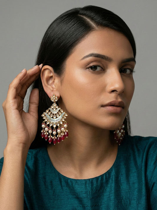 Maroon Kundan chandbali earrings with mother-of-pearl detailing and cascading pearl drops for bridal and wedding wear