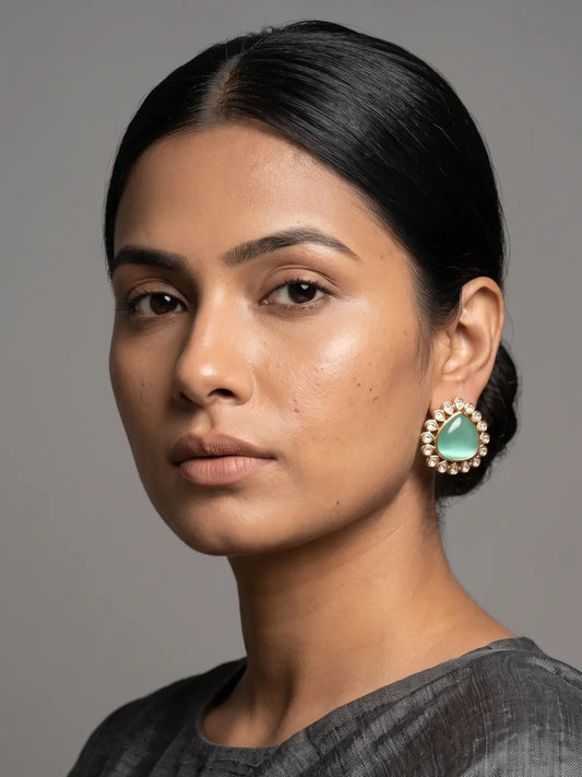 Mint green oversized polki kundan earrings with teardrop centre stone, delicate round polki stones and gold plated setting