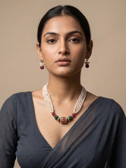 Natural freshwater pearl multi-strand necklace set with red and green jade beads, Kundan-style pendant and matching earrings.