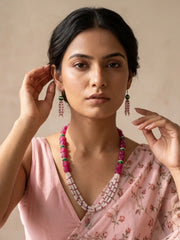 Pink jade and rainbow moonstone layered beaded mala featuring green accent beads and spacer details in a multi-strand design.