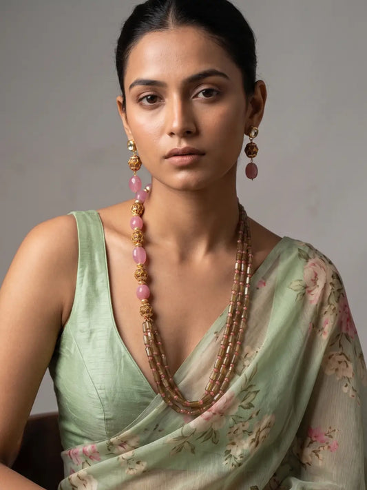 Pink and green jade beaded necklace set with layered strands, gold-tone Pacchi beads, Kundan details and matching long-drop earrings for ethnic styling