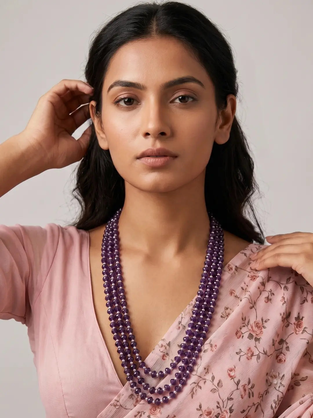 Purple amethyst and freshwater pearl layered necklace featuring multiple strands of natural gemstone beads for traditional and festive wear.
