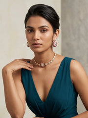 Red gold plated Polki Kundan choker with uncut stones, enamel detailing and matching earrings, designed for wedding and party wear outfits.