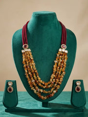 Red jade and natural citrine gemstone necklace featuring layered beads, Kundan accents and gold-plated detailing.