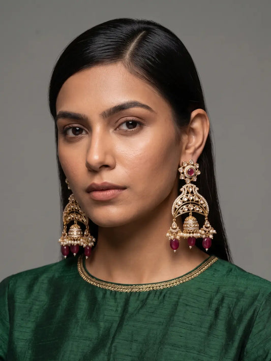 Designer red Kundan Polki Jhumka earrings featuring sparkling Kundan stones, American diamonds, gemstone beads and pearl accents.