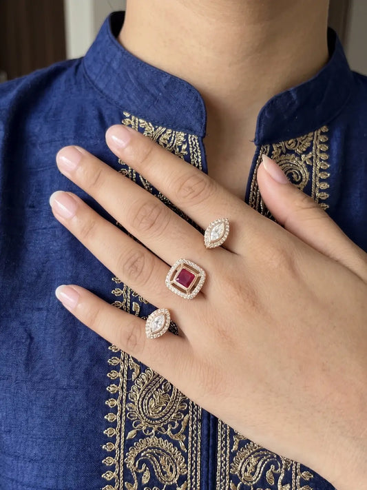 Red square-shaped Kundan Polki dual finger ring with gold plating and CZ details, designed for wedding, bridal, festive and party wear looks.