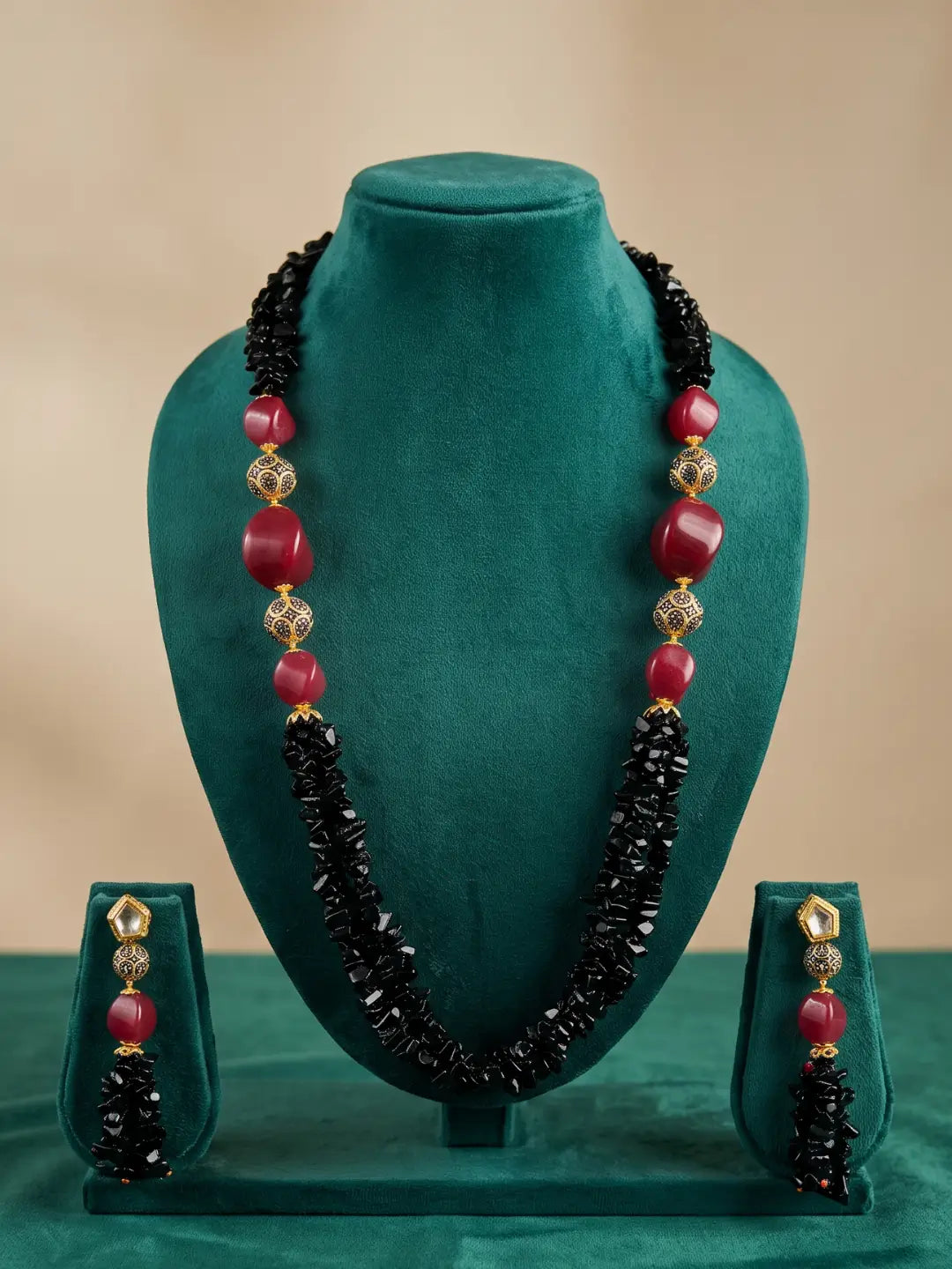 Red and black beaded necklace and drop earrings set with gold-plated detailing, suited to festive, party and wedding function styling